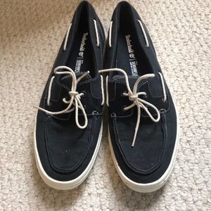 Black pair of timberland canvas moccasin shoes